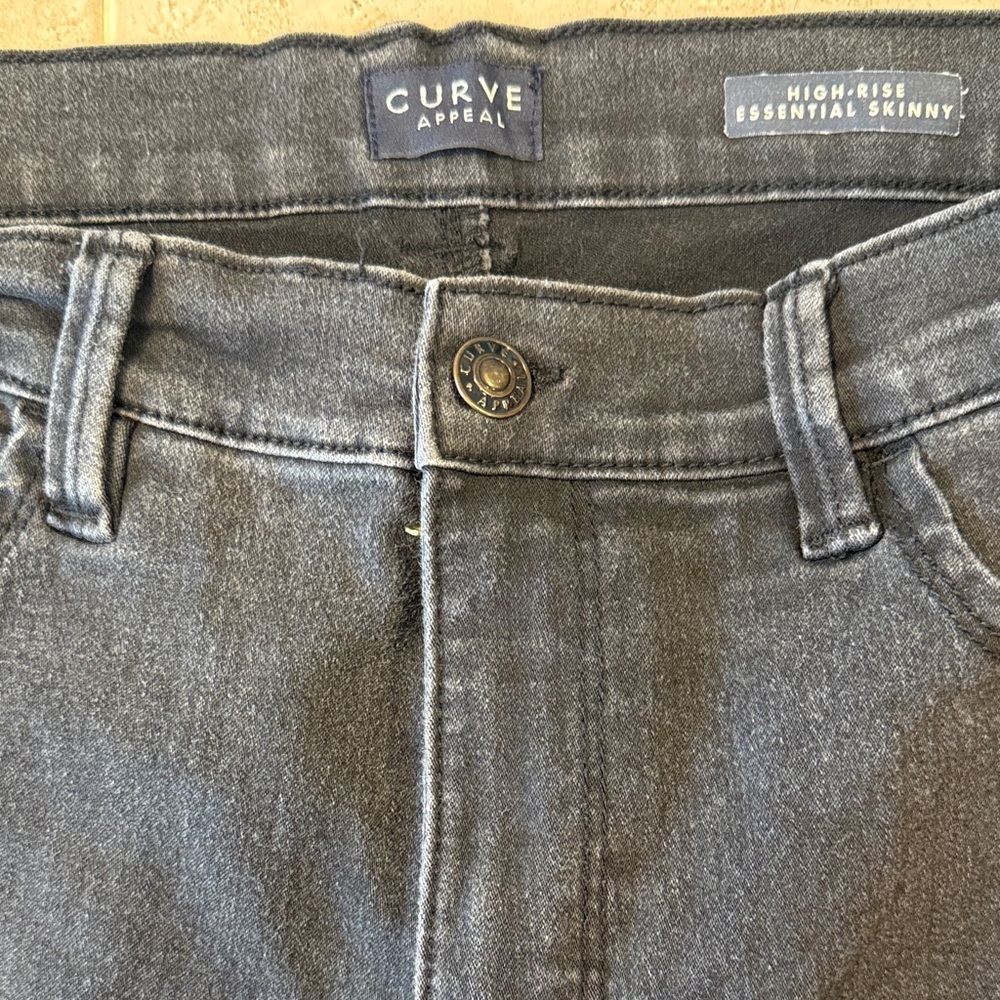 Women's Curve Appeal High-Rise Essential Skinny Jeans in light black.